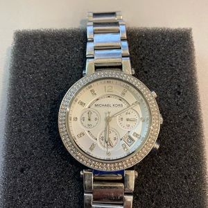 Women’s silver Michael Kors watch